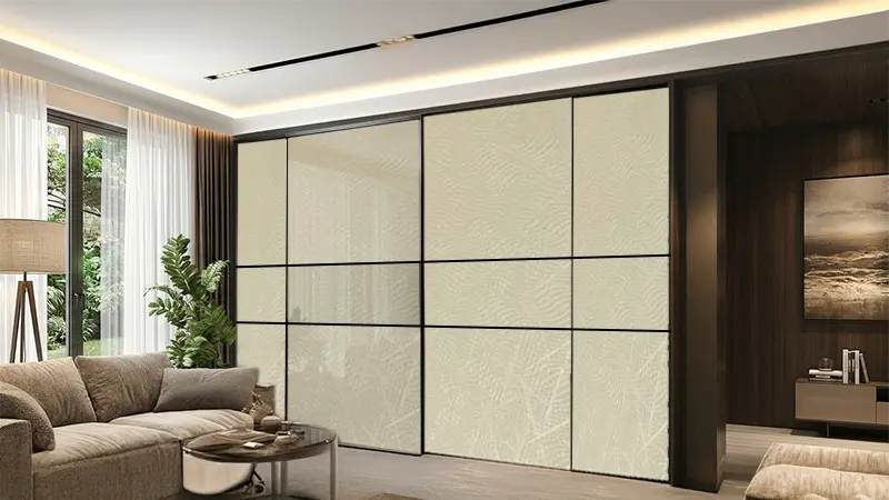 Sliding door wardrobe with ivory beige designer wooden laminate sheet finish creating a bright and elegant modern interior